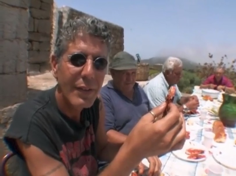 Anthony Bourdain with caper framers